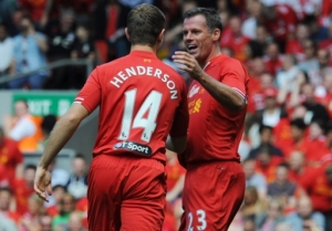 Henderson celebrates with Jamie Carragher as Henderson scores Liverpool's second 